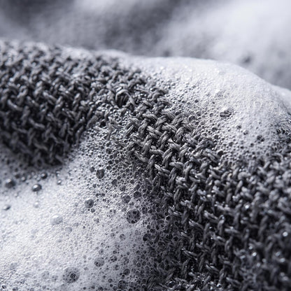 Close-up of the SilkyBuff textured weave with soap lather