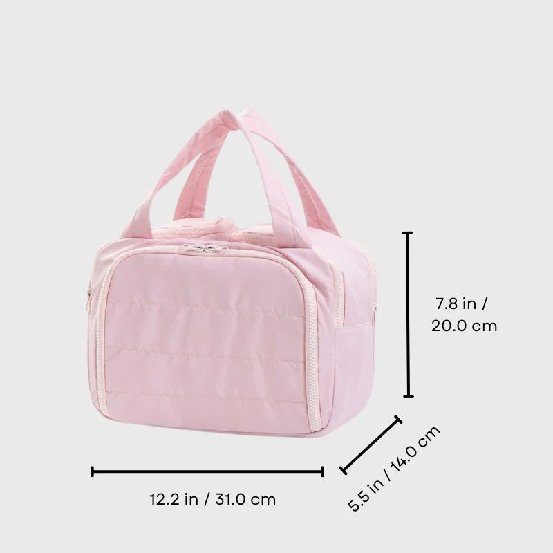 Pink travel bag with dimensions on a light gray background
