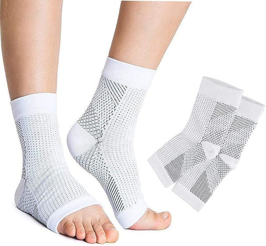 White ankle support sleeves worn by a person with additional sleeves displayed on a white background.